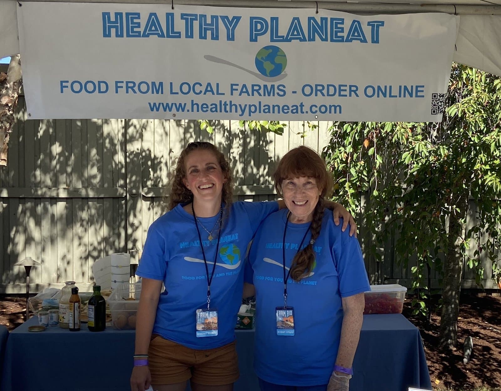 Rosemary Ostfeld and her mother at a Healthy PlanEat farmers market stand