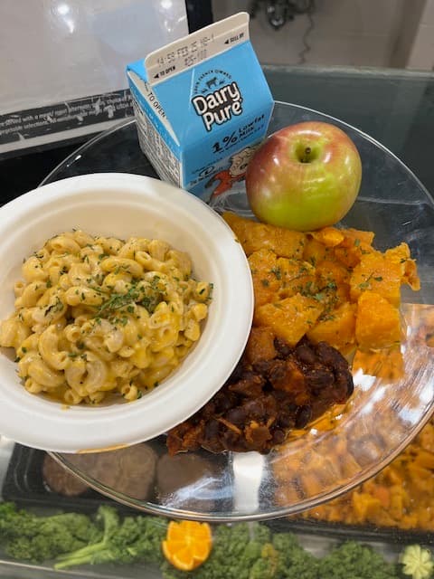 Students being served fresh local food